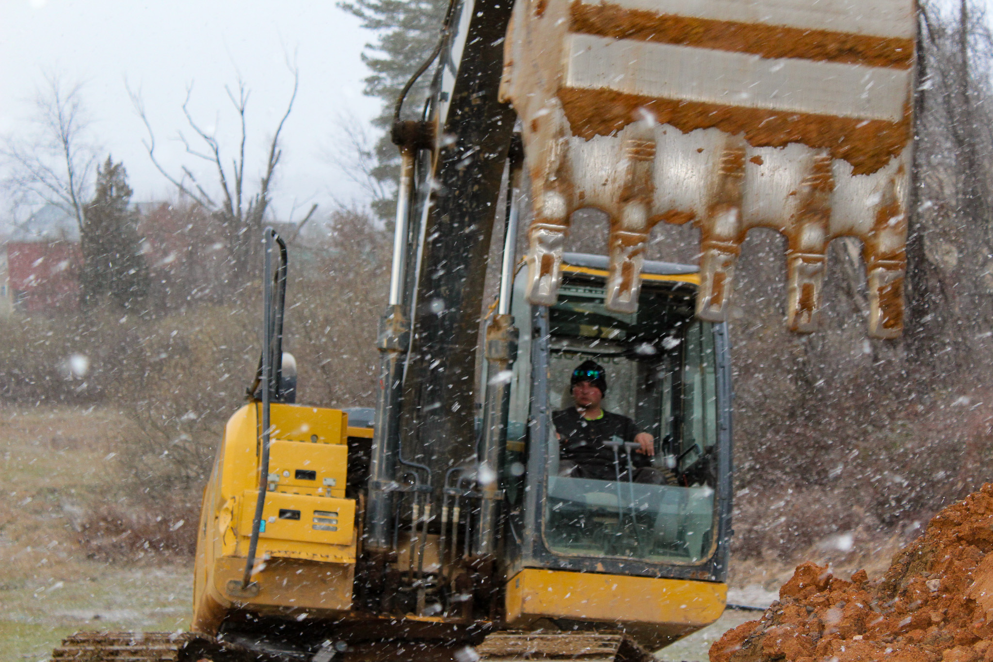 Excavator operating at a construction site